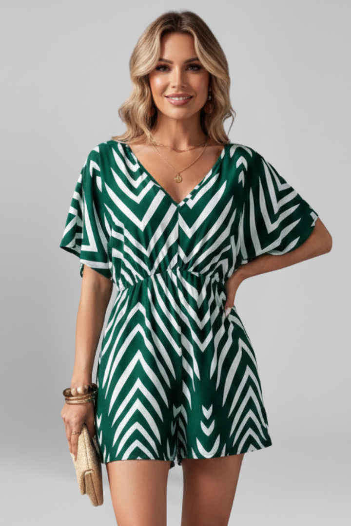 Dame jumpsuit med V-udskæring og mønstret overflade