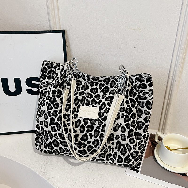 Wisteria | Women's Woven Leopard Print Tote With Chain Straps