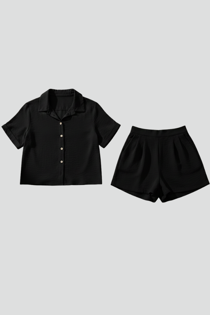 Dame kort jumpsuit med knaplukning og korte ærmer