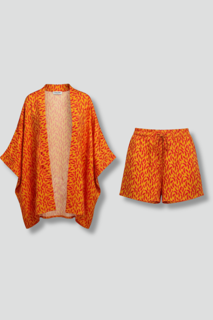 Dame todelt sæt med åben jakke og shorts