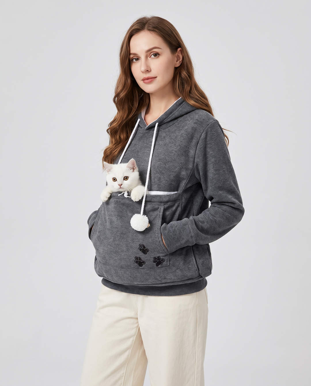 Romane | Women's Fleece Pet Pouch Hoodie with Pom-Pom Drawstring - three-quarter view