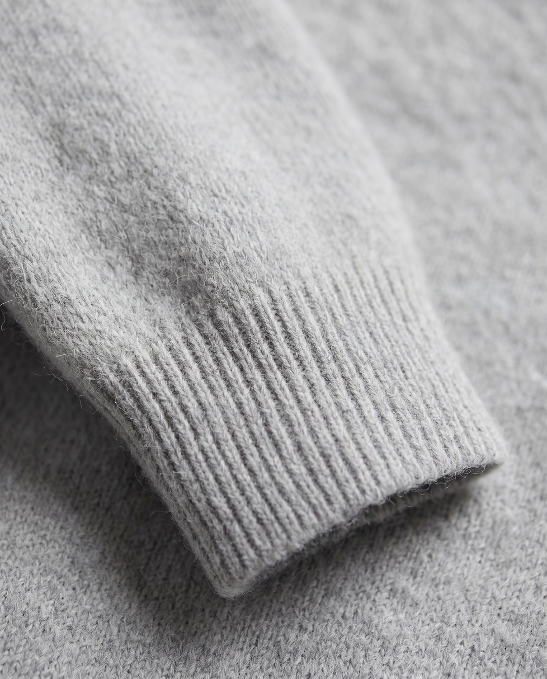 Emerald | Women’s Knitted Sweater with Round Neckline and Dropped Shoulders - fabric detail