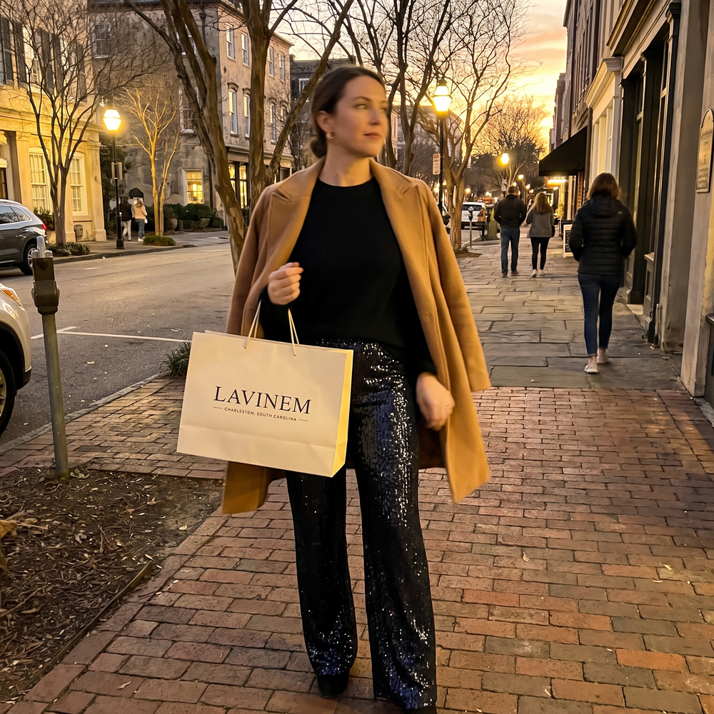 Customer photo: sequin wide-leg trousers with a camel coat, carrying a Lavinem shopping bag