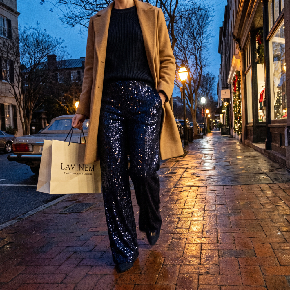 Customer photo: navy sequin wide-leg trousers with a camel coat and a Lavinem shopping bag