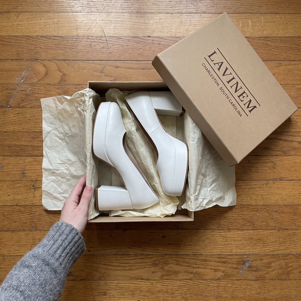 Customer photo: white platform heels in an open Lavinem shoe box